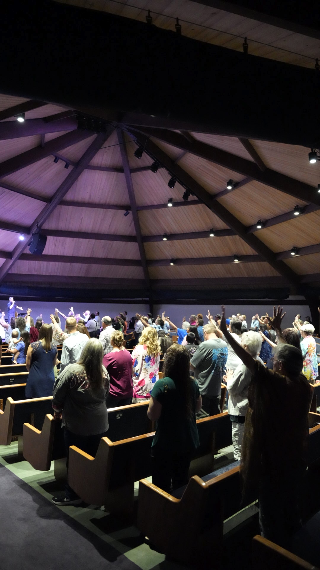 Congregation worshipping with hands raised at Grandview Church
